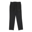Alexander McQueen black Flat Front Trousers size 50