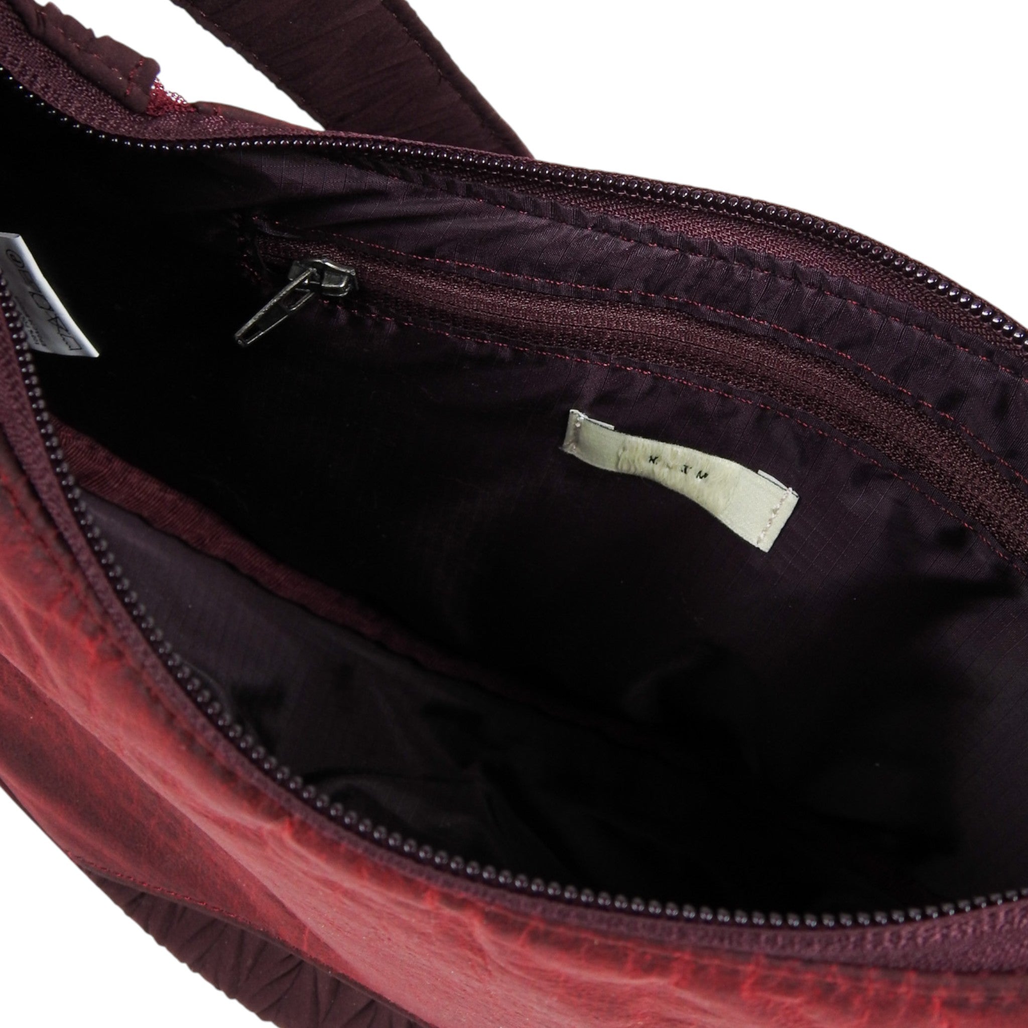 XLIM Crossbody Bag