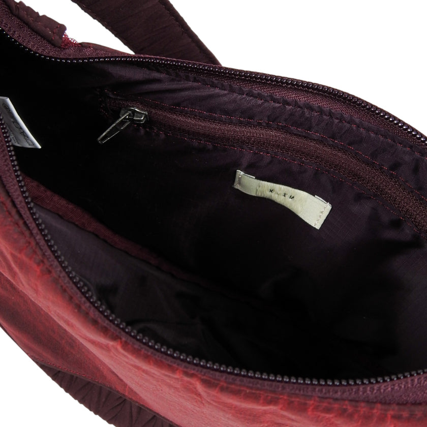 XLIM Crossbody Bag